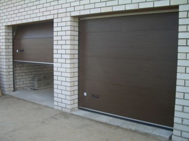 Утепленные гаражные механические ворота на две машины